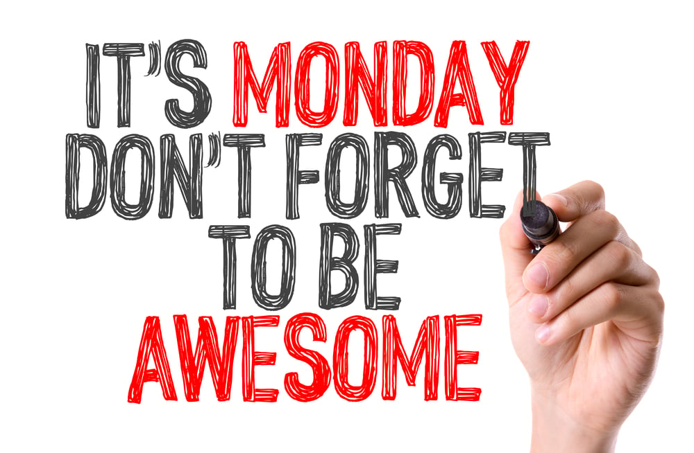 Hand with marker writing Its Monday Dont Forget to be Awesome